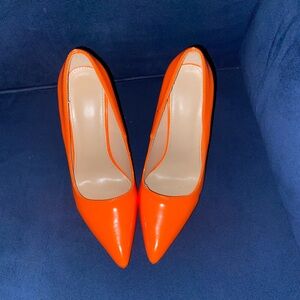 •Orange pointy toe heels•